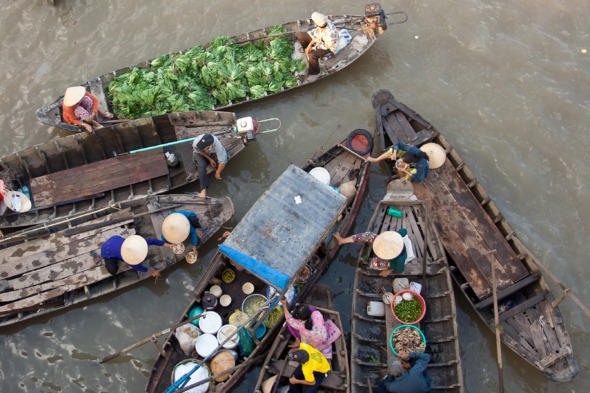 Floating market on the Mekong river in Vietnam