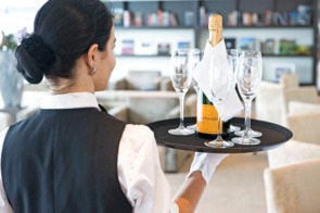 Scenic river cruises - Butler serving Champagne